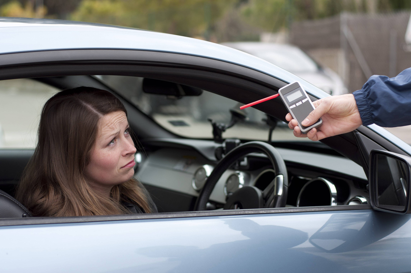 A driver failing a breathalyser test