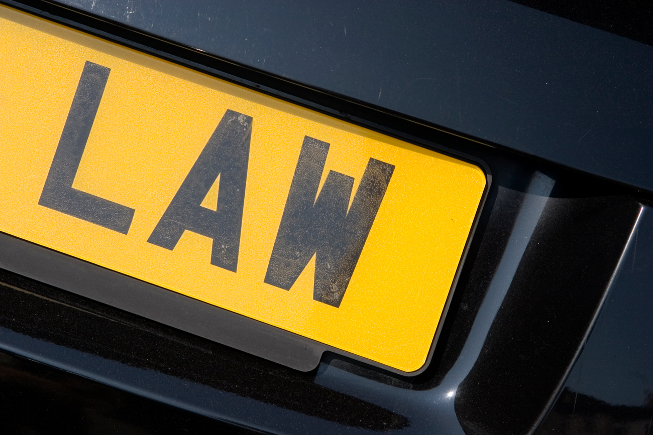 A number plate with letters spelling law