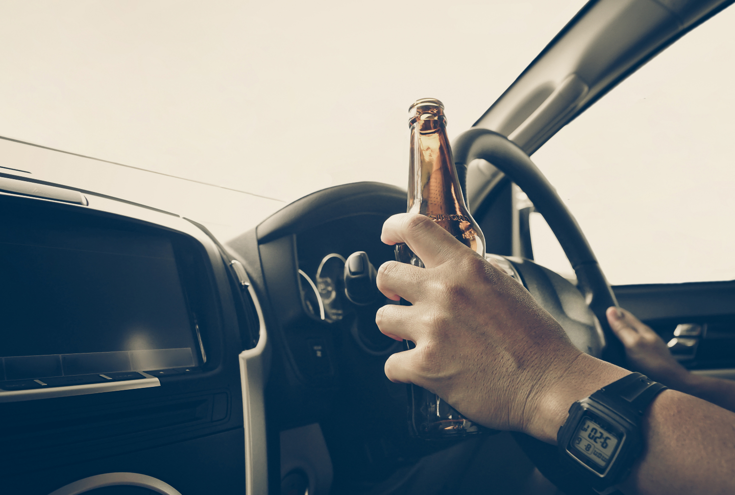 man-drinking-whilst-driving.jpg
