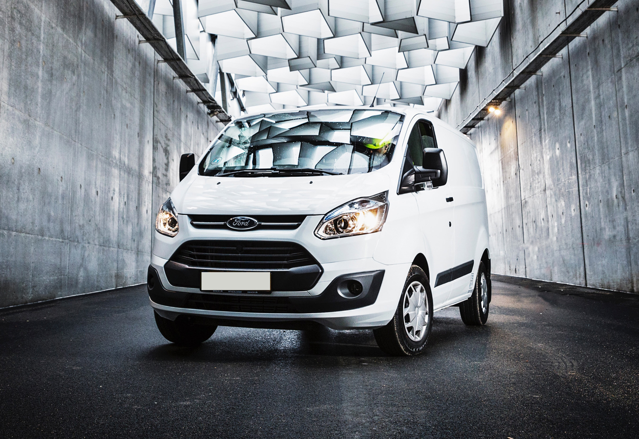 The latest Ford Transit model under a patterned roof